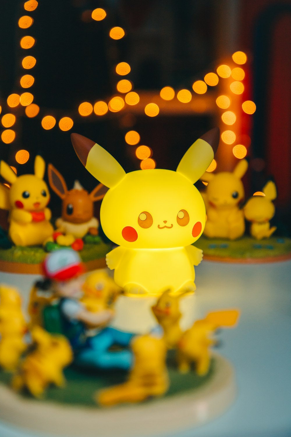 a group of pokemon figurines sitting on top of a table