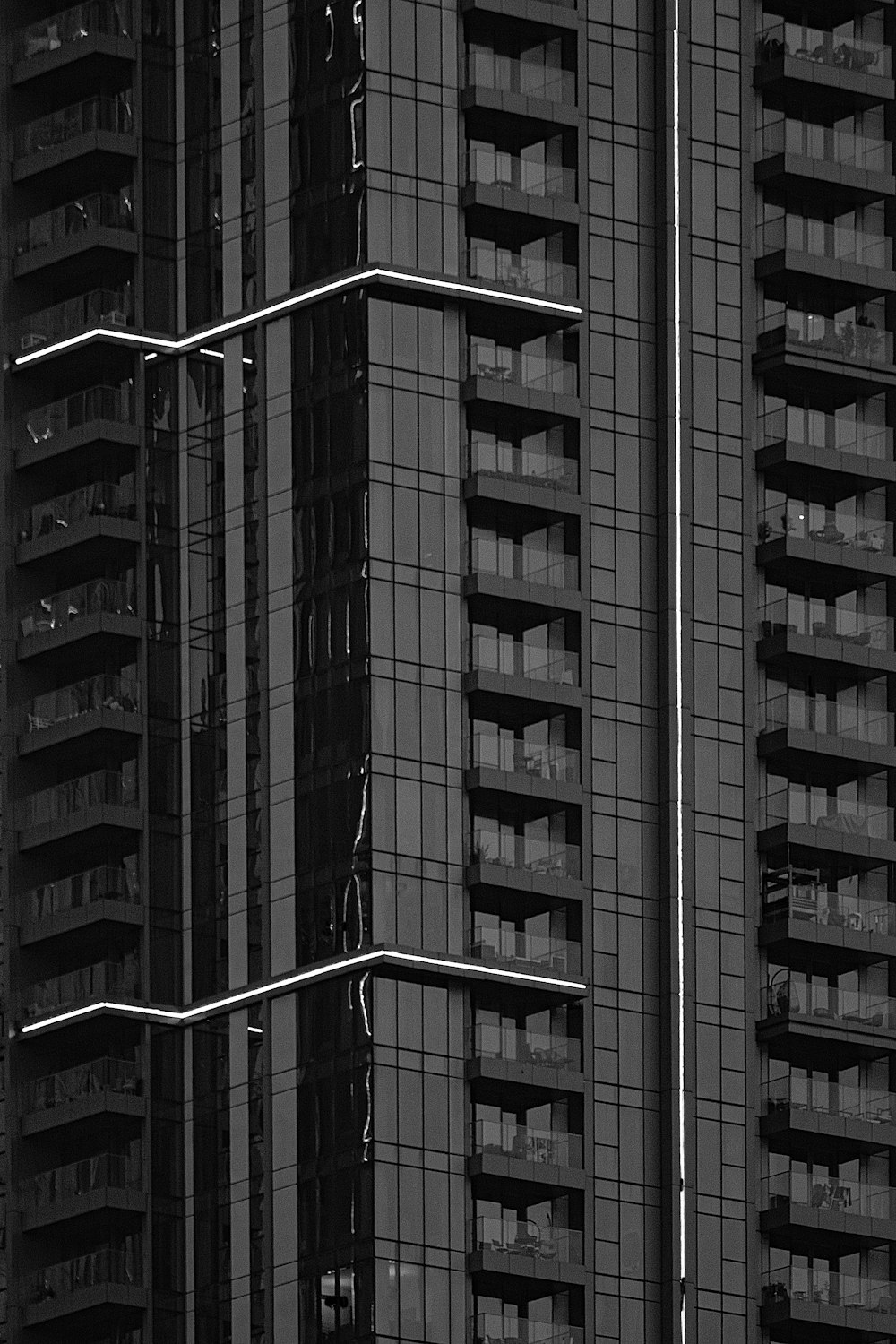 a black and white photo of a tall building