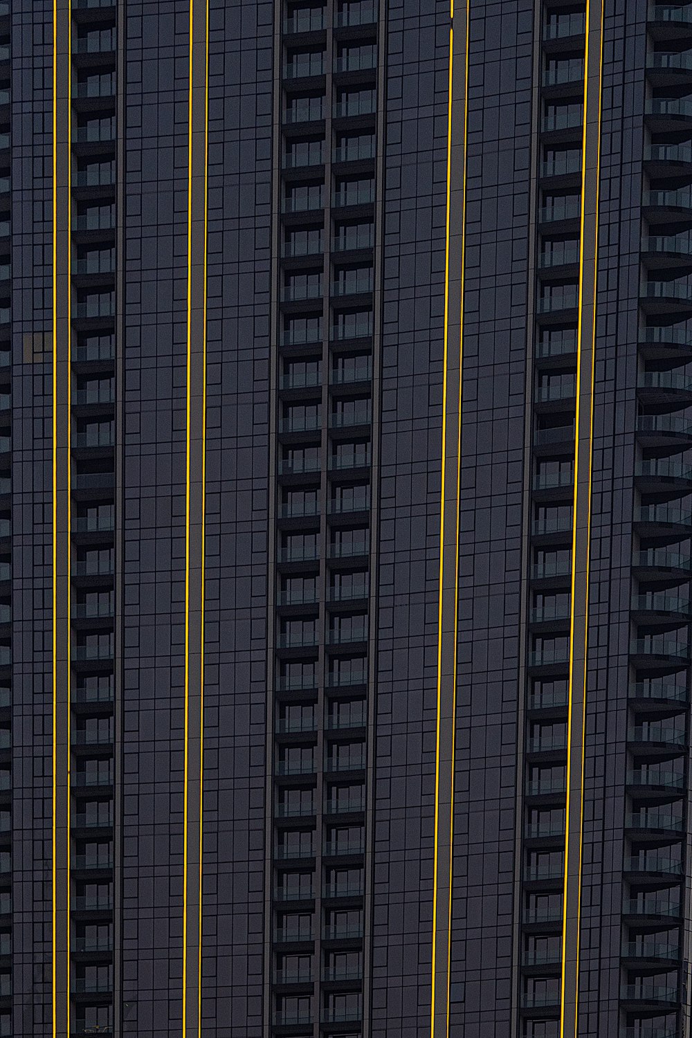 an airplane is flying over a tall building