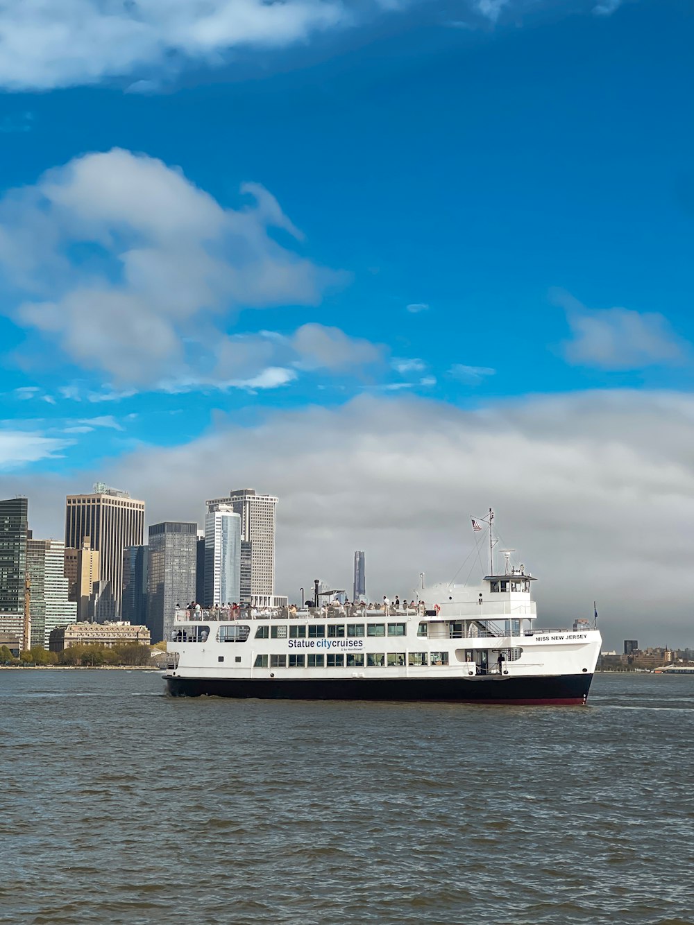 a large boat floating on top of a body of water