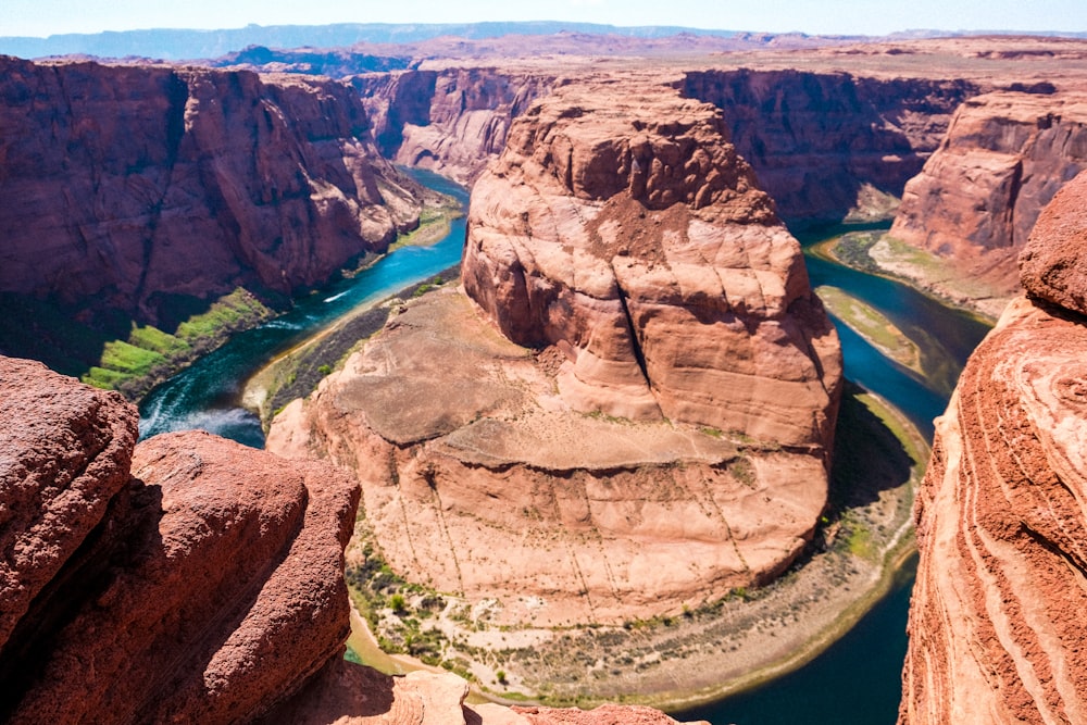 a view of a river in the middle of a canyon