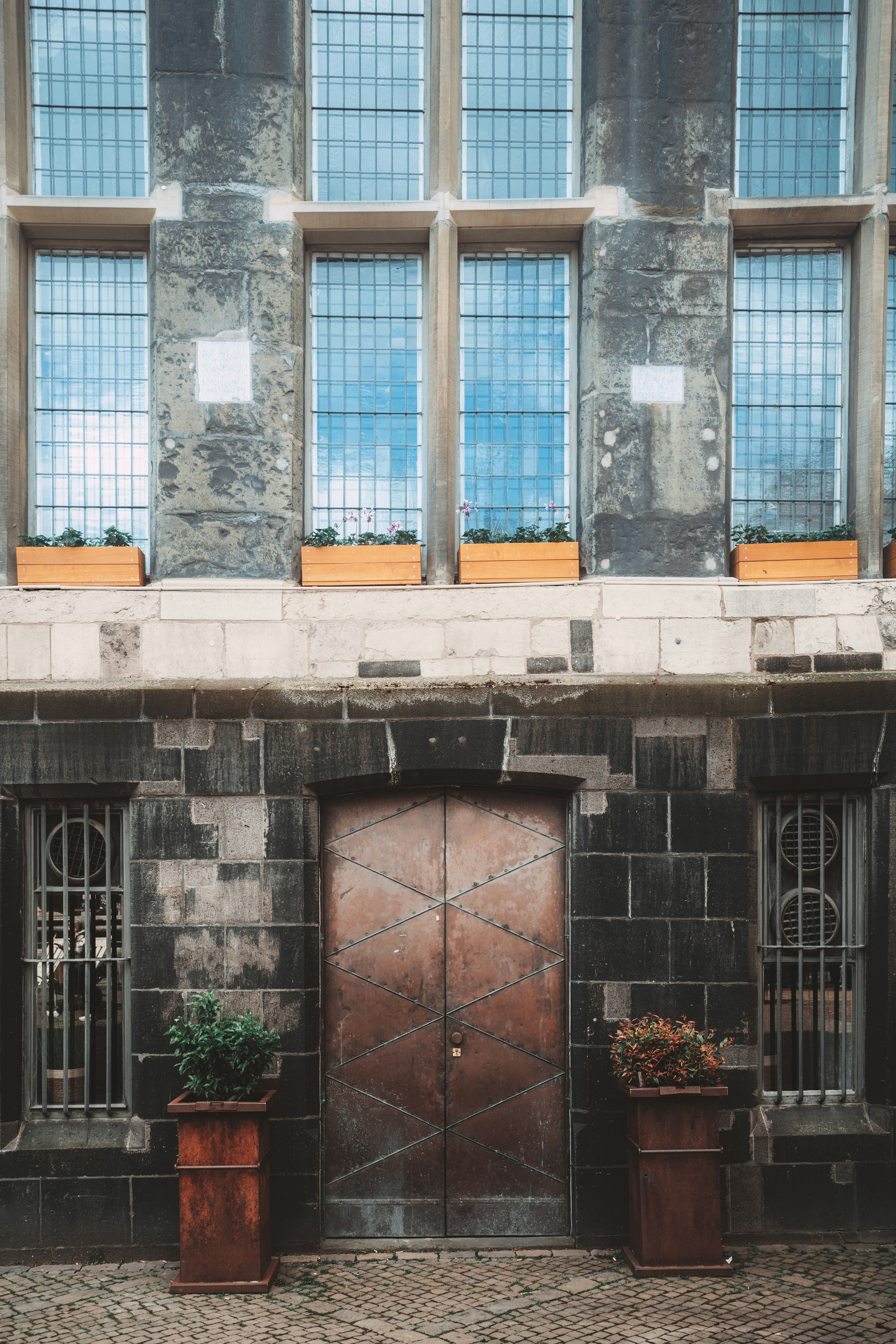 a couple of brown doors sitting next to each other