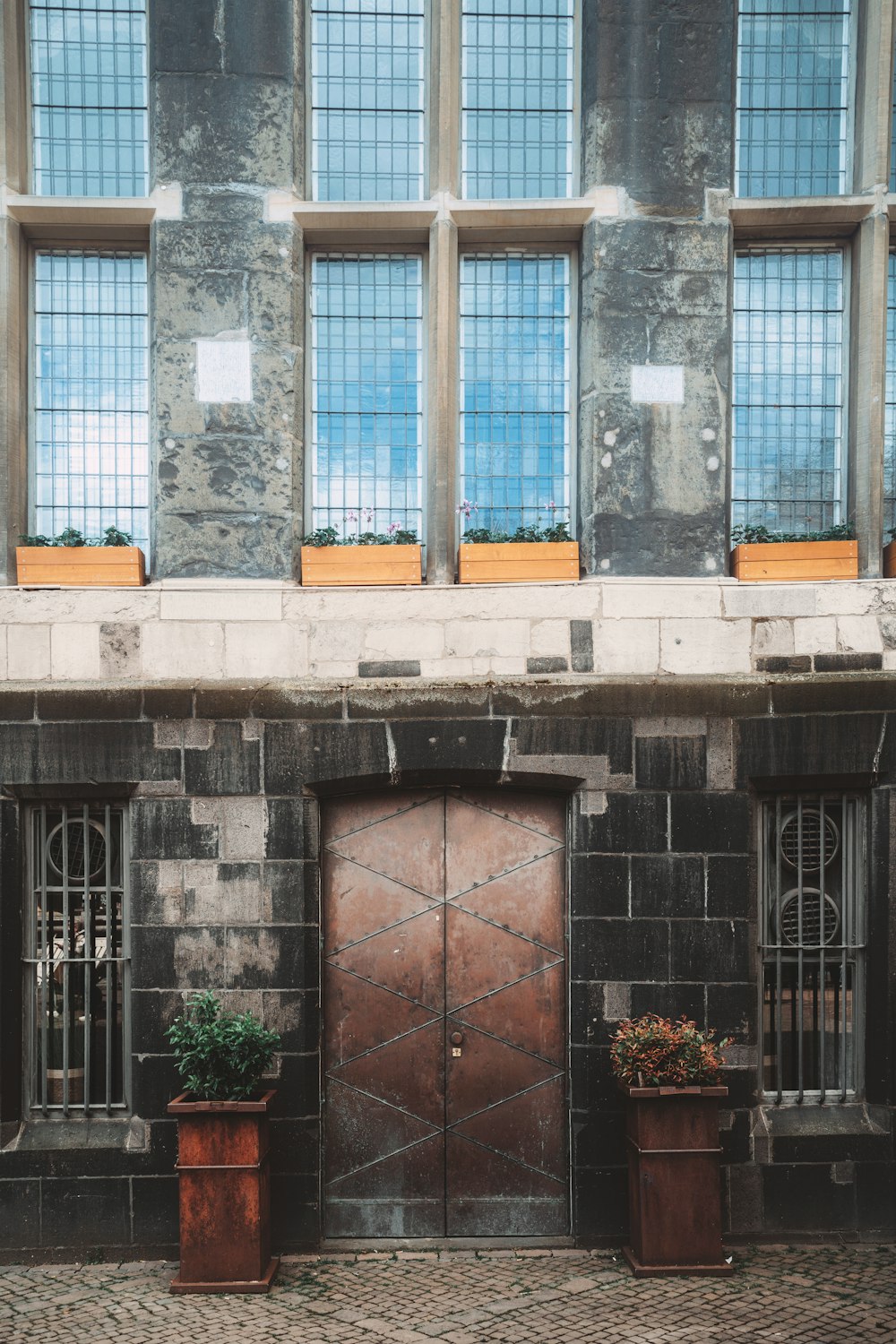 a couple of brown doors sitting next to each other