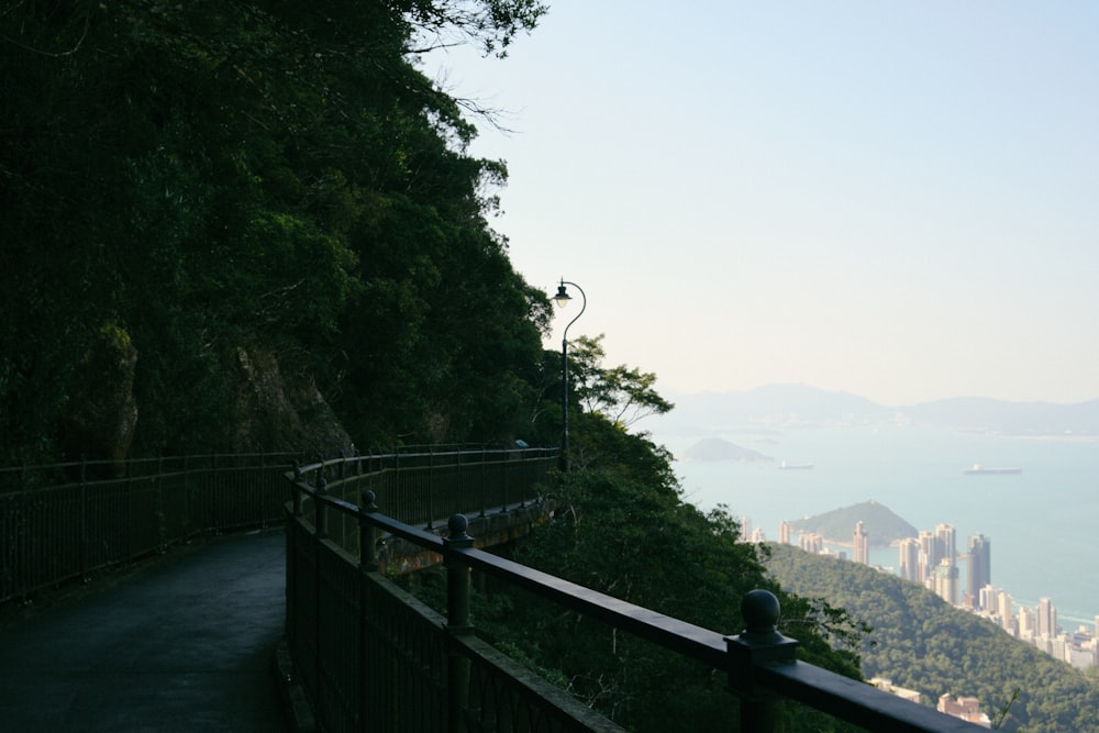 a scenic view of a city and a body of water