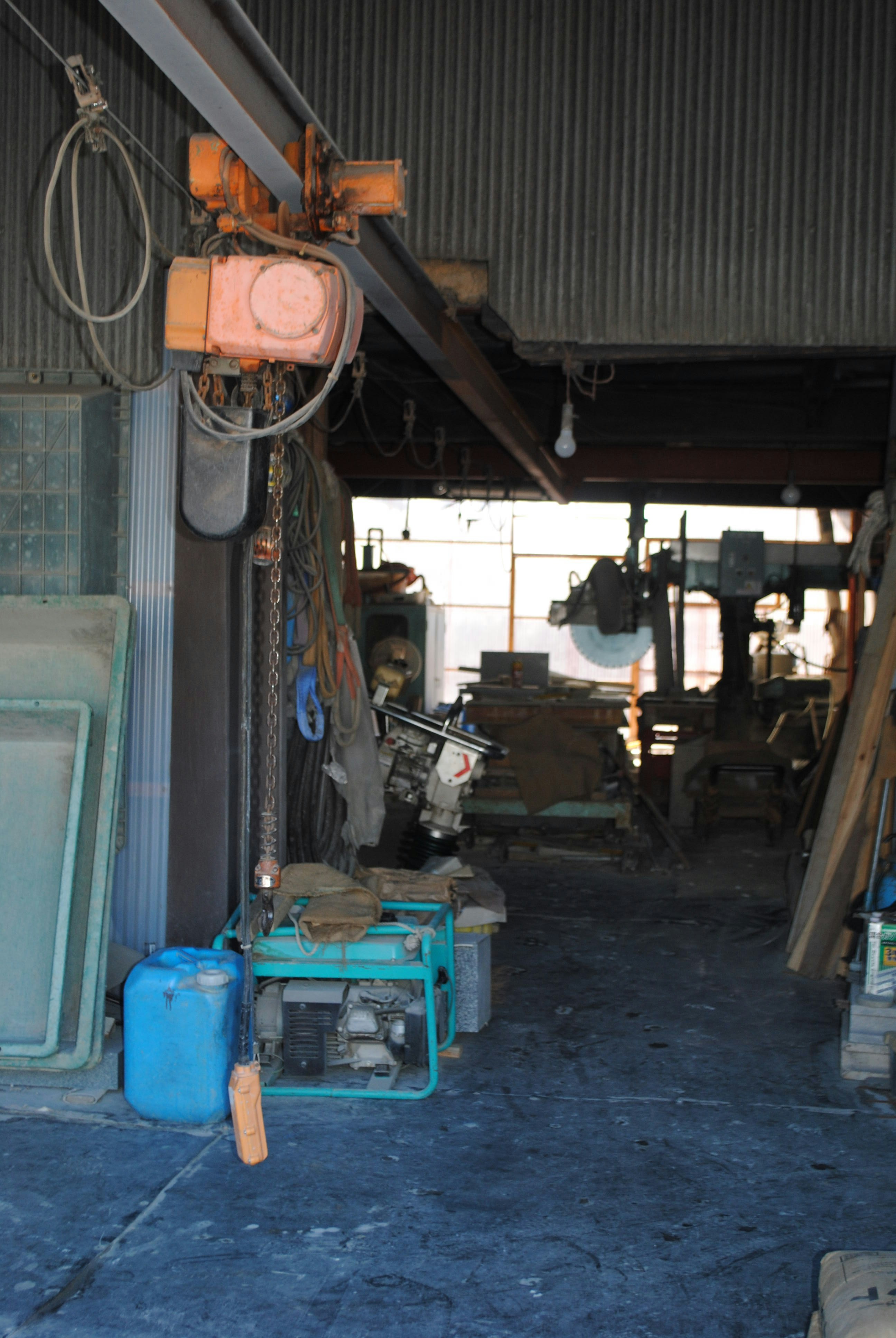 a garage filled with lots of tools and equipment