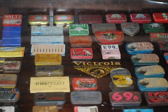 a display case filled with lots of different types of matchboxes