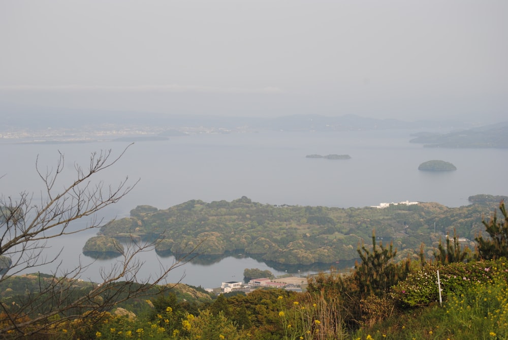 a view of a body of water from a hill