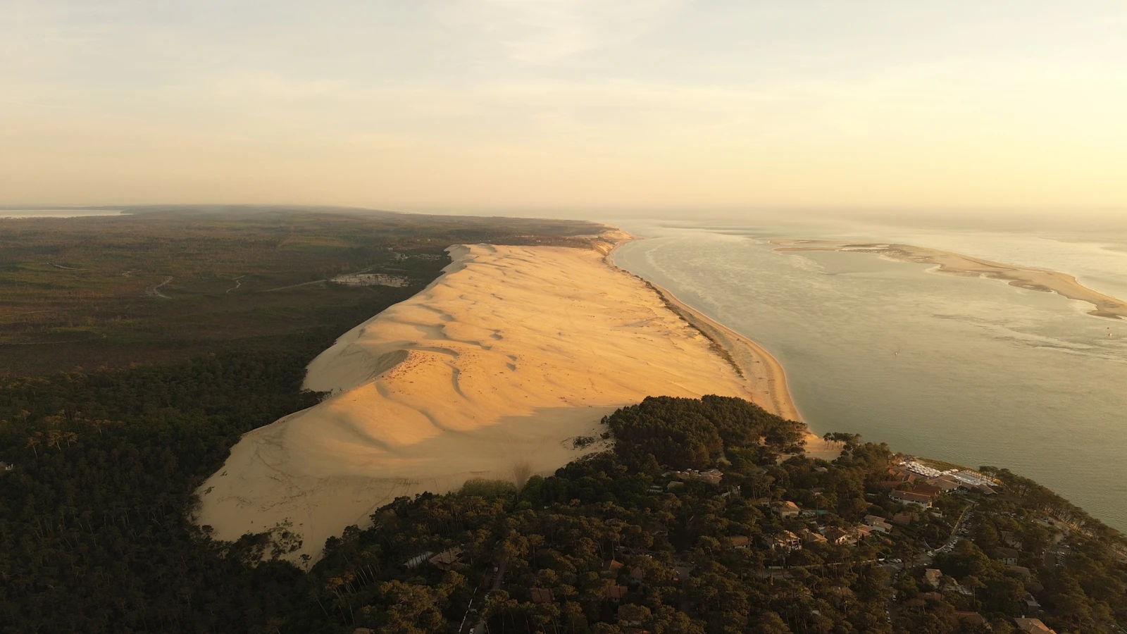 The Parnidis dune at Nida from the air, sand between the lagoon and the forest