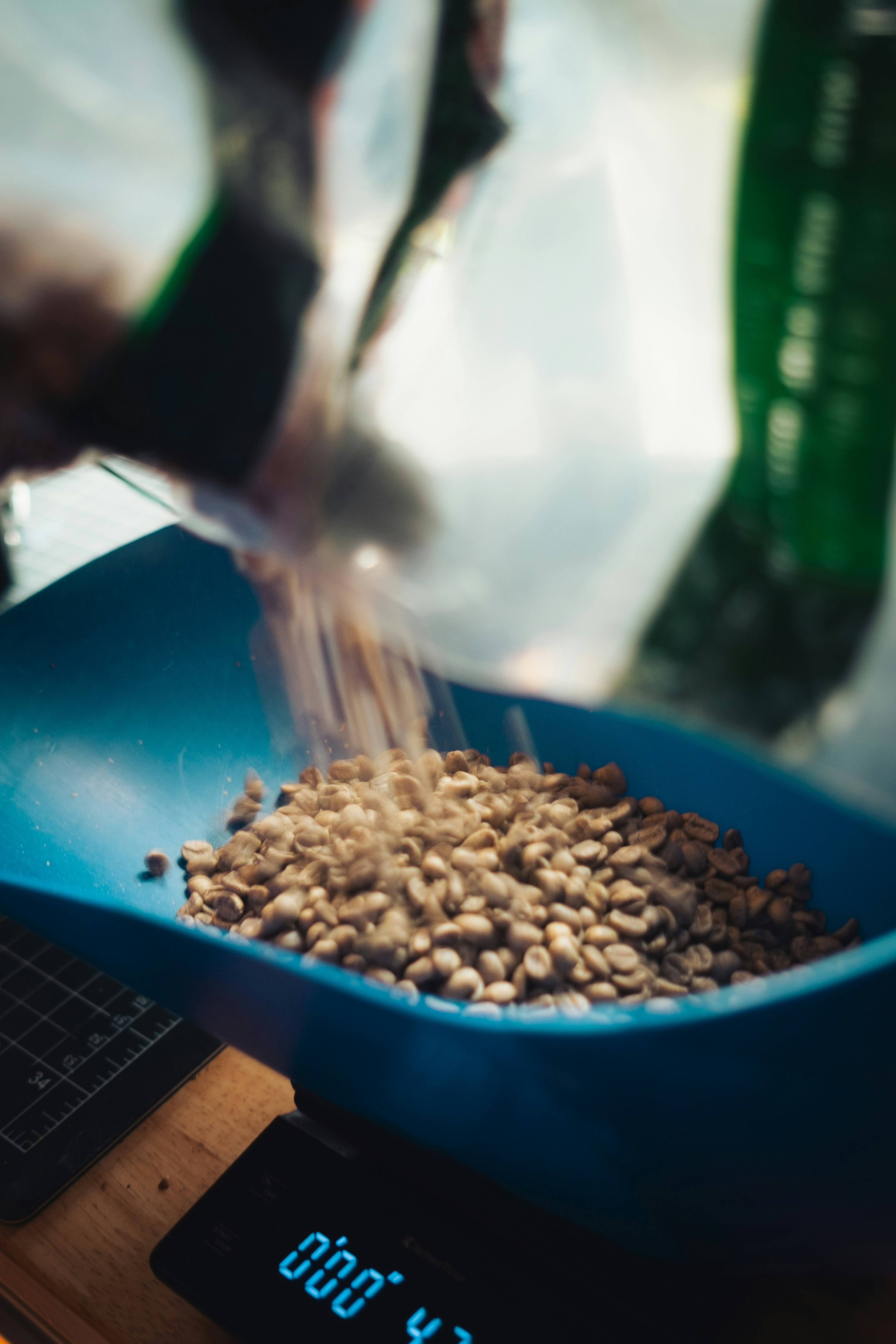 a blue bowl filled with food on top of a scale