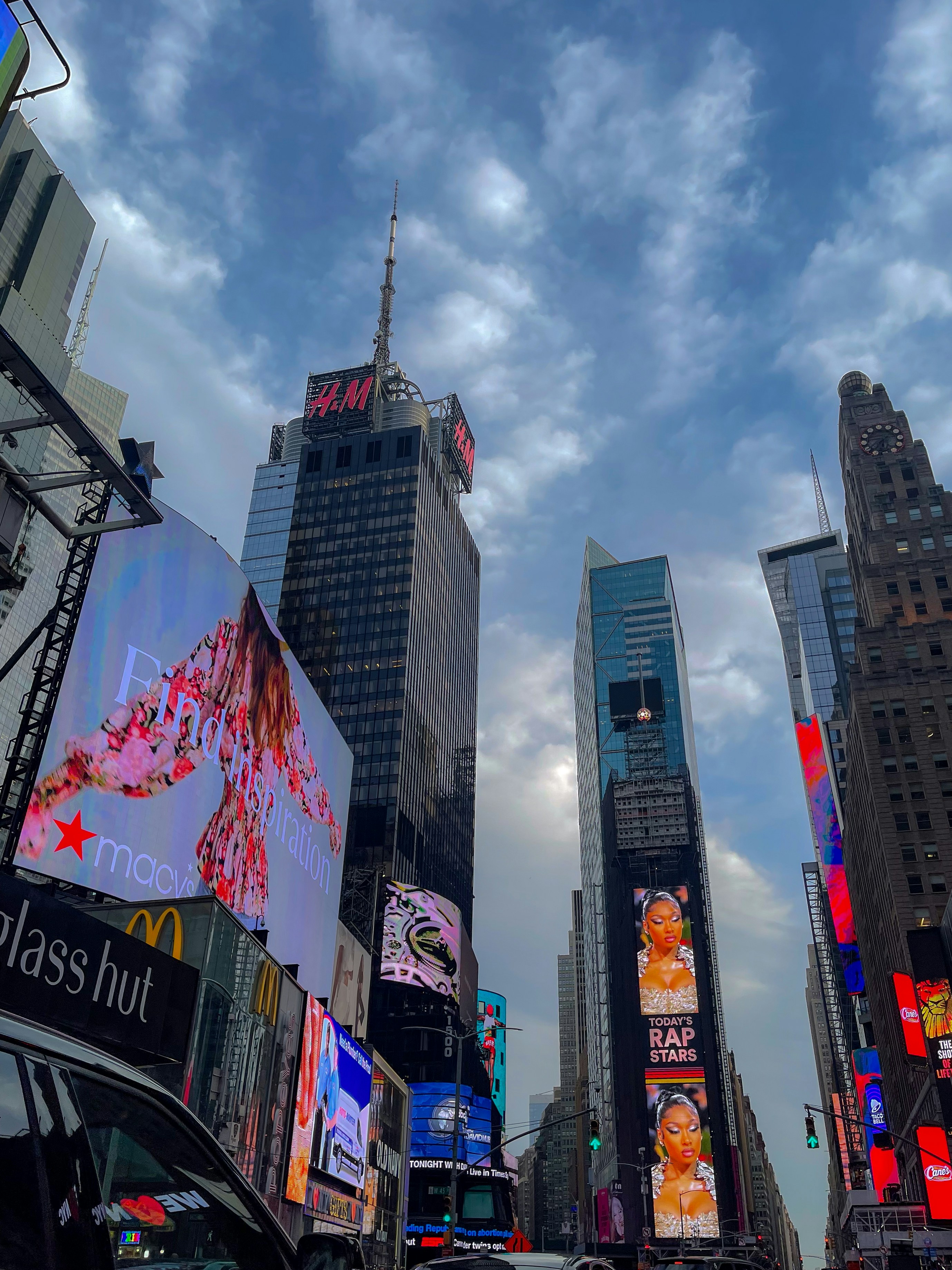 a city street filled with lots of tall buildings