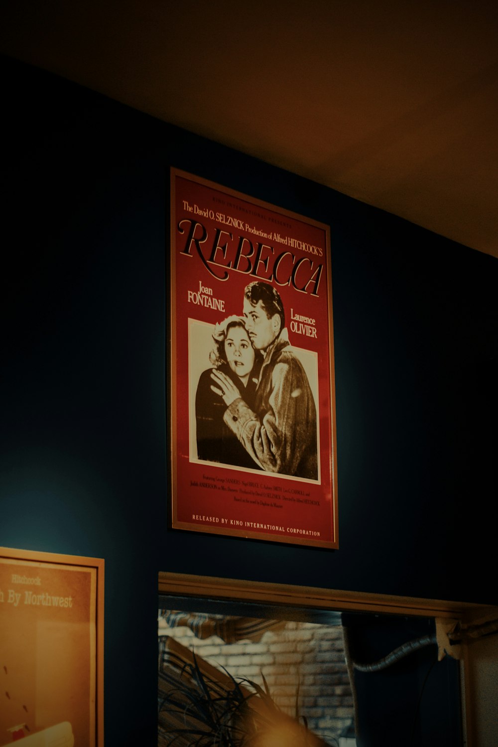 a movie poster hanging on the wall of a room