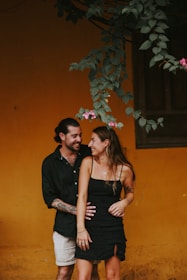 a man and a woman standing next to each other