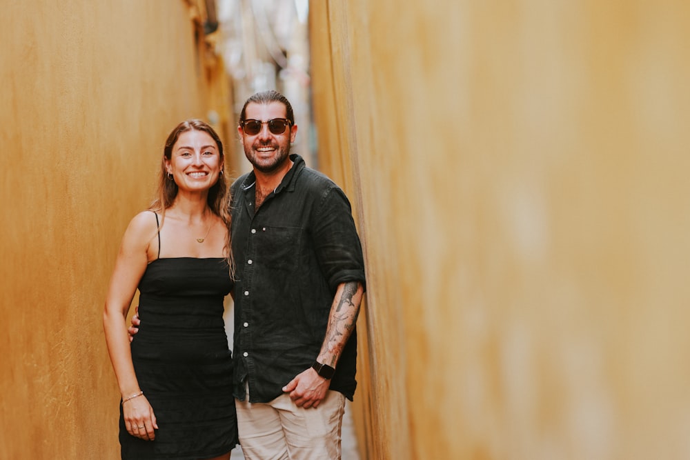 a man and a woman standing next to each other