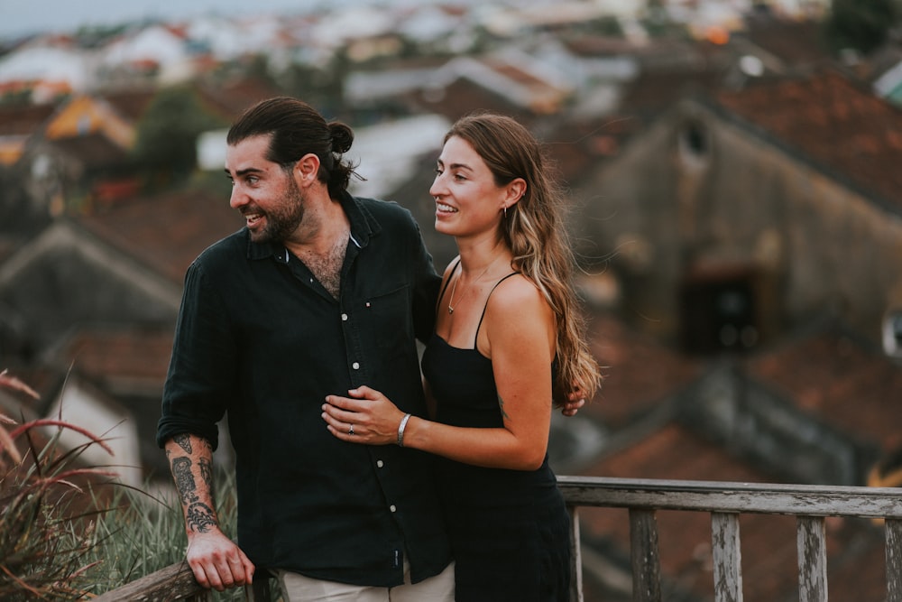 a man and a woman standing next to each other