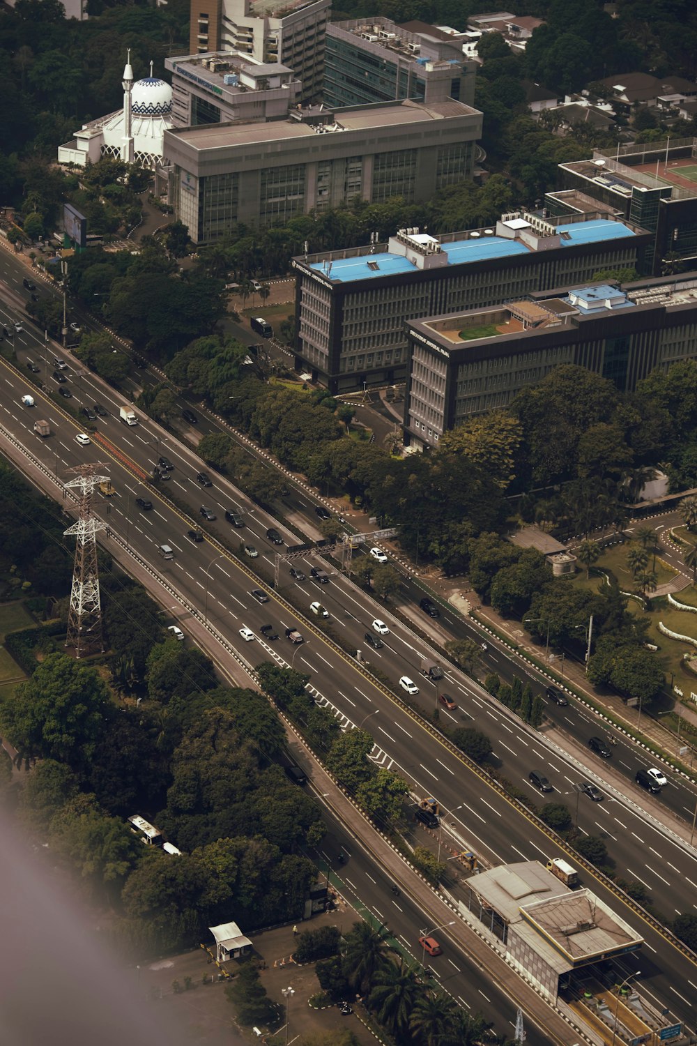 an aerial view of a city with a lot of traffic