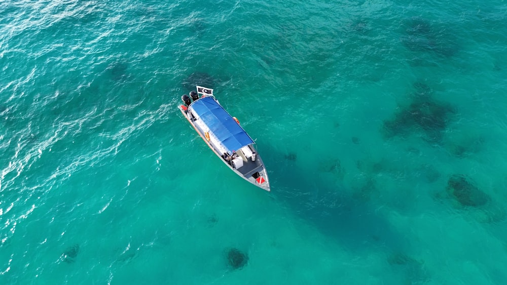 a boat floating on top of a body of water