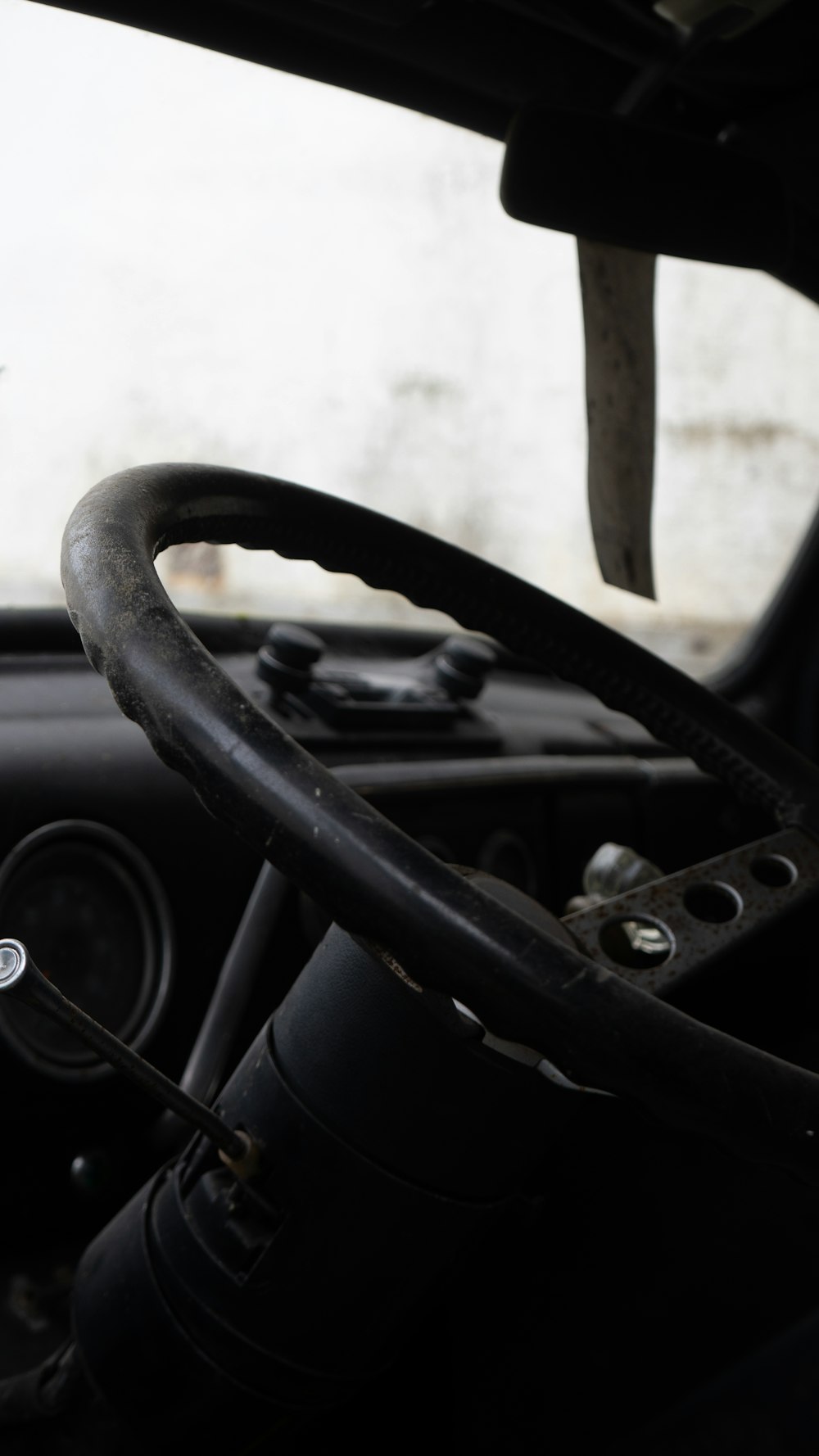 a steering wheel and dashboard of a vehicle
