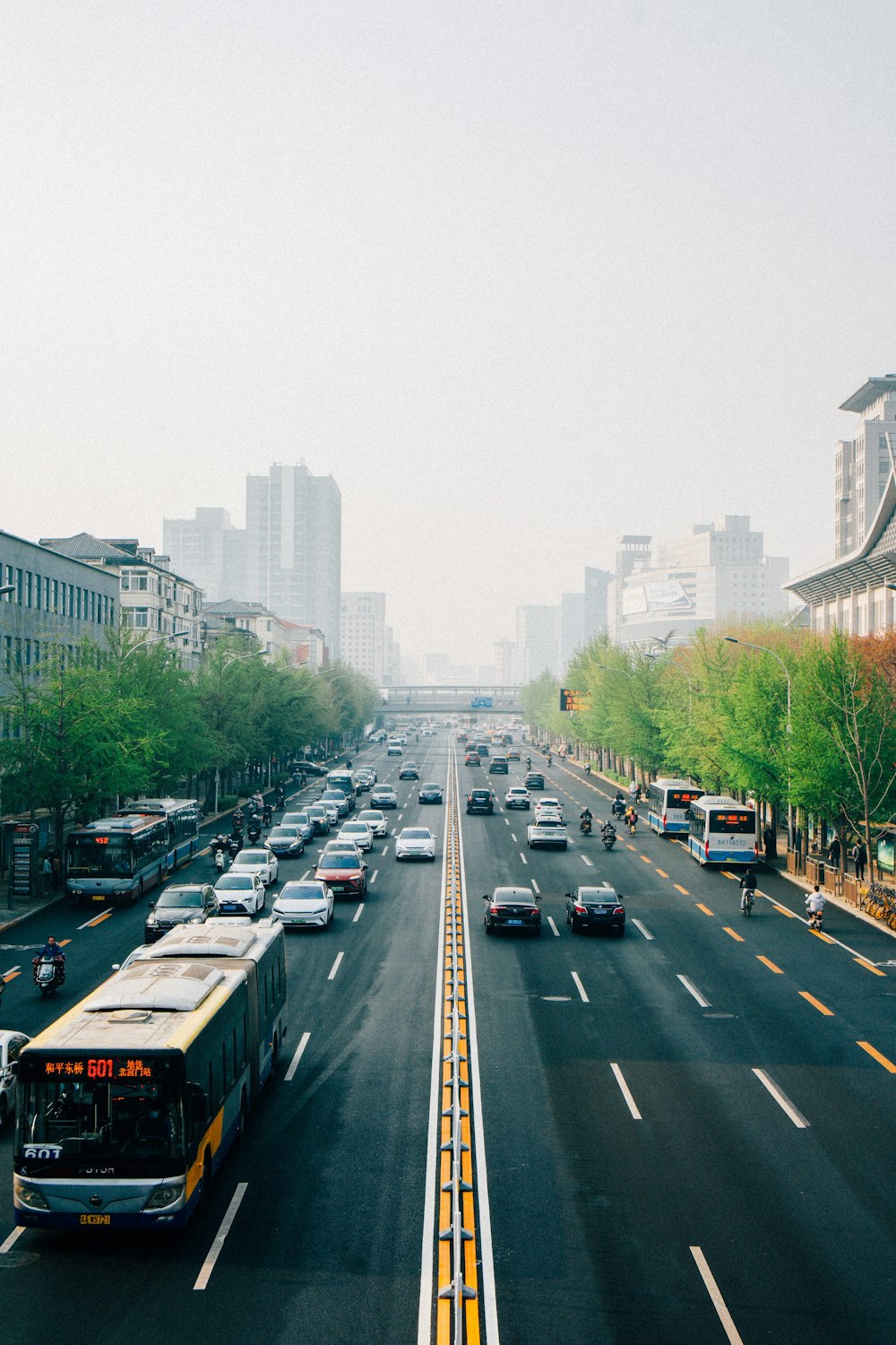 a city street filled with lots of traffic