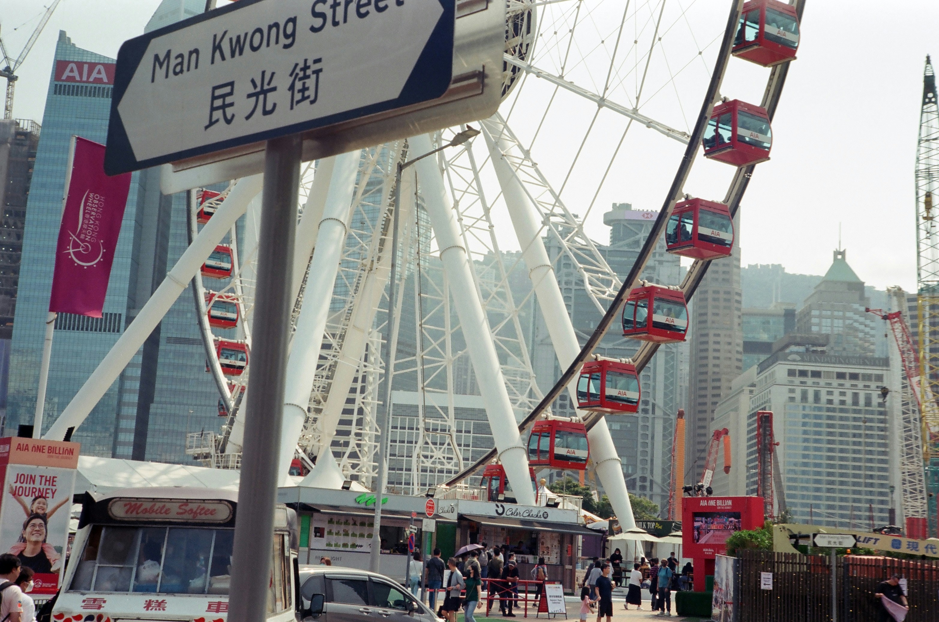a ferris wheel in the middle of a city