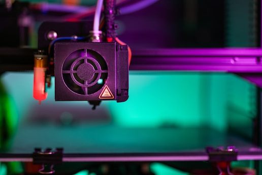 a close up of a machine with a purple light
