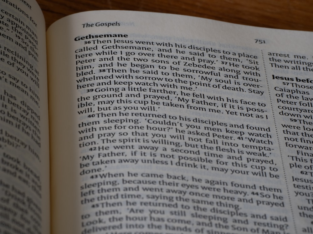 a close up of an open book on a table