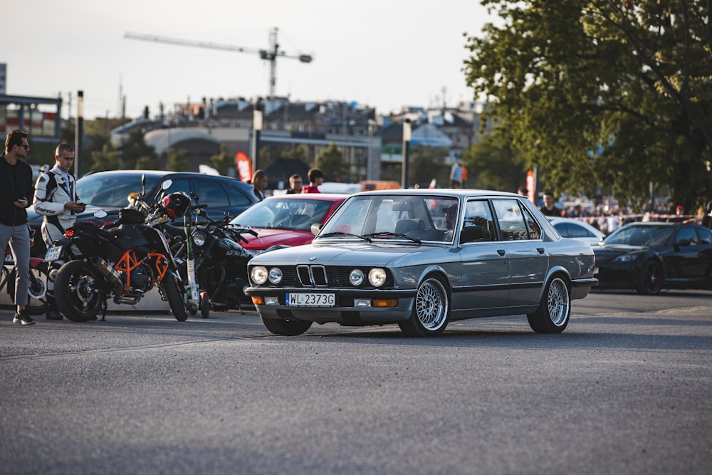 a group of cars parked in a parking lot