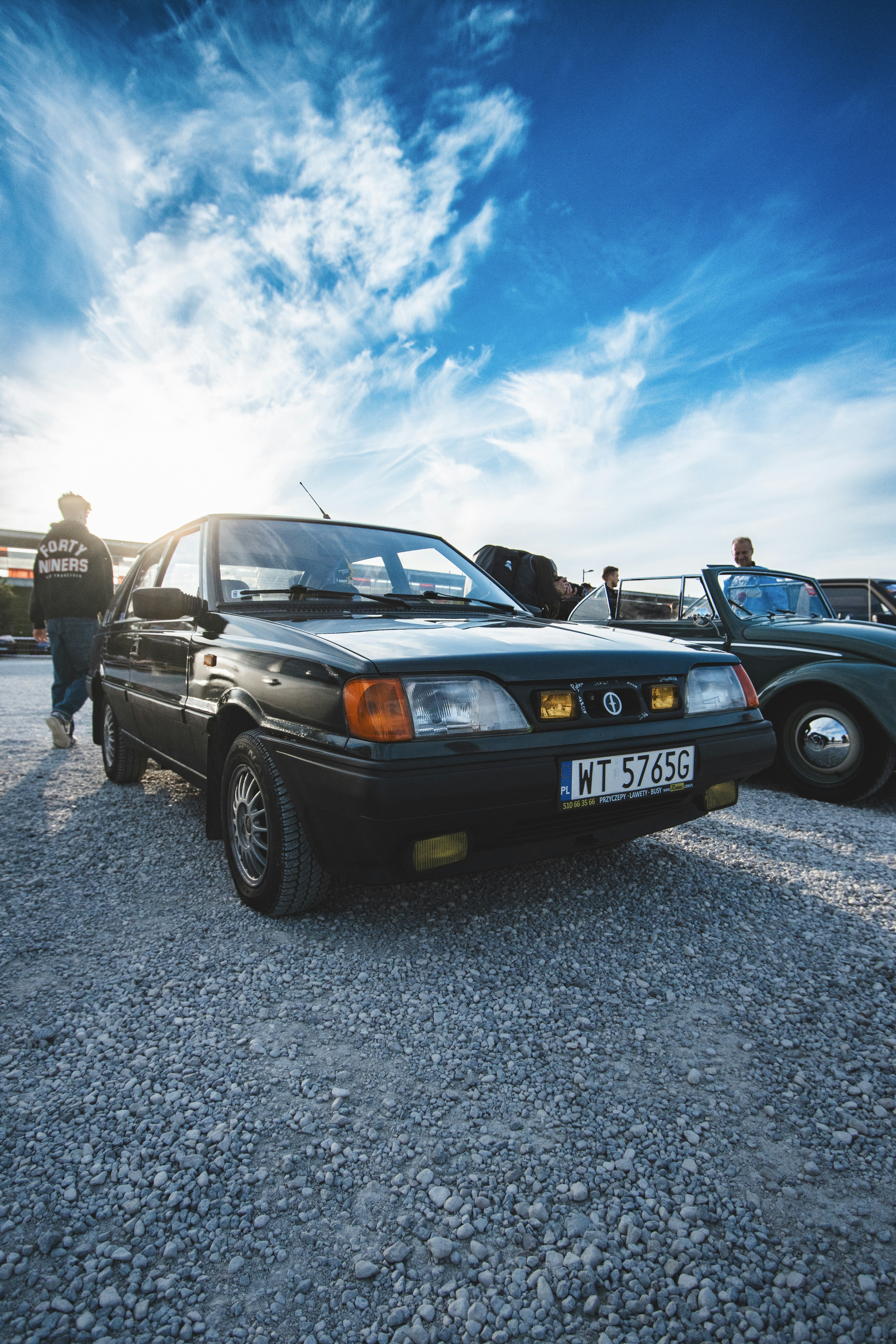 a couple of cars parked next to each other