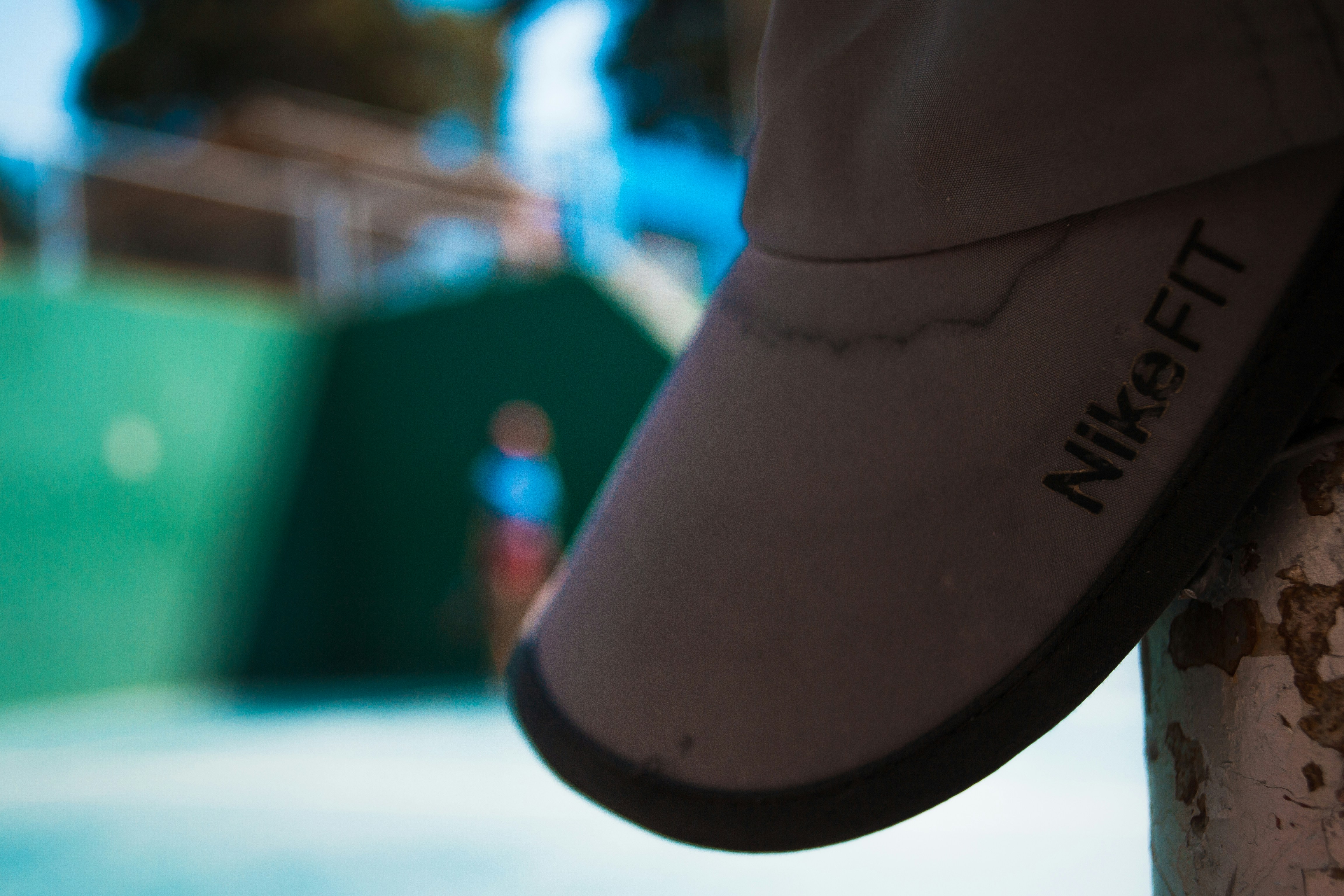 a close up of a person's shoes on a skateboard