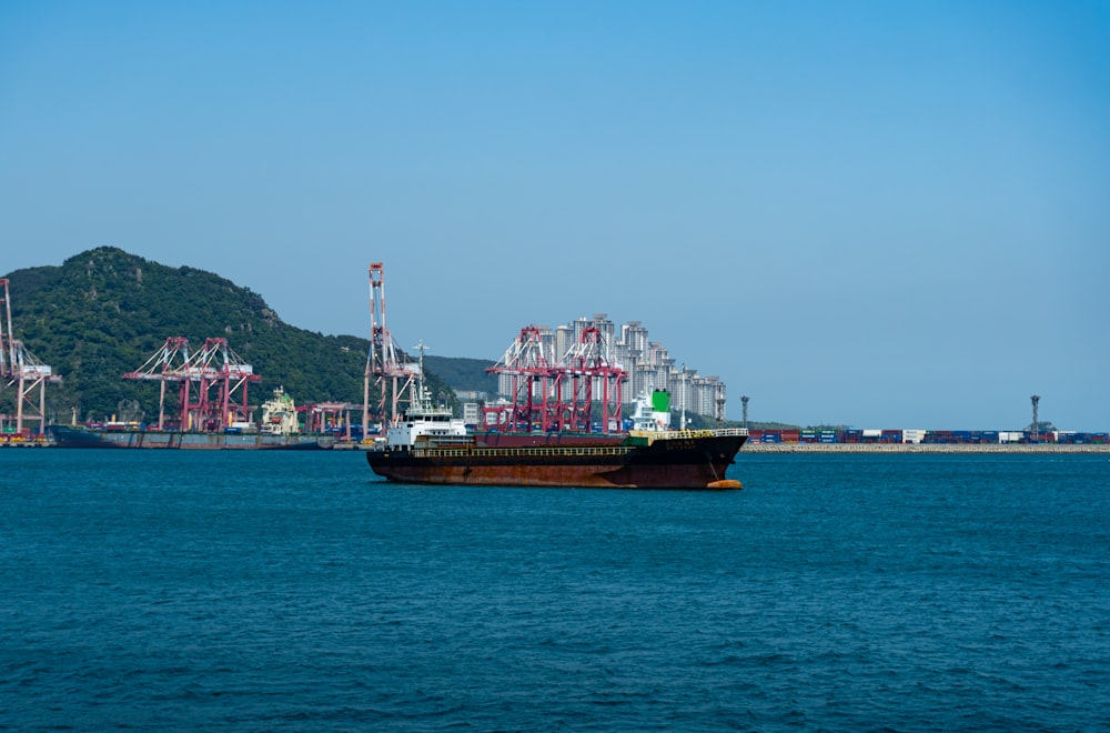 a large boat floating on top of a large body of water