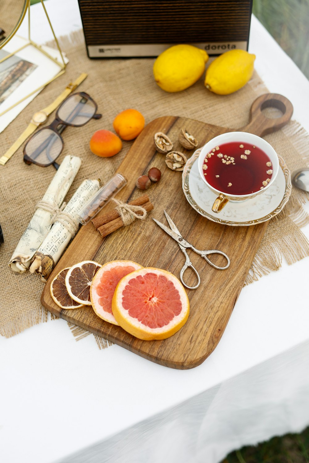 a wooden cutting board topped with grapefruit slices