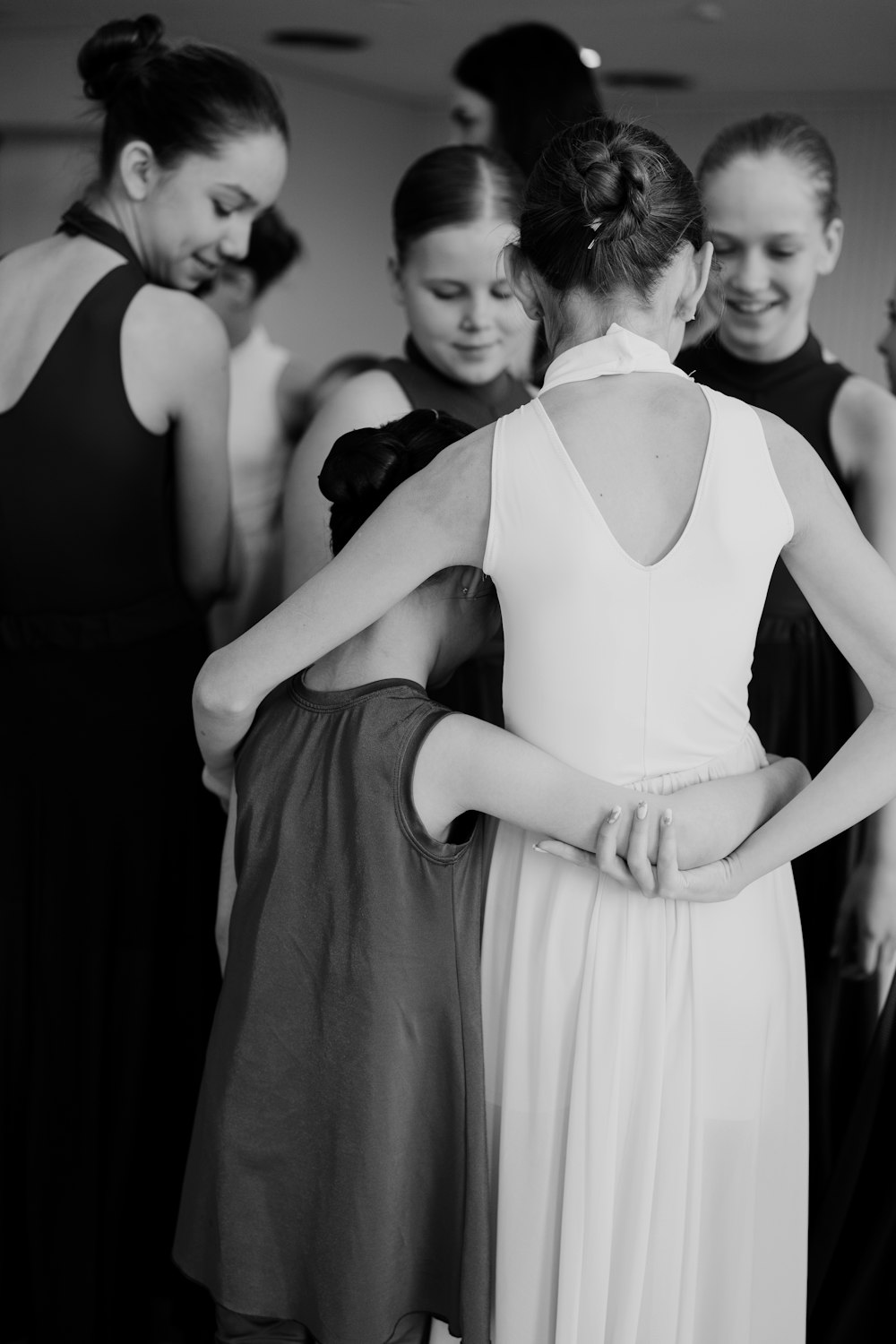 a group of women standing next to each other