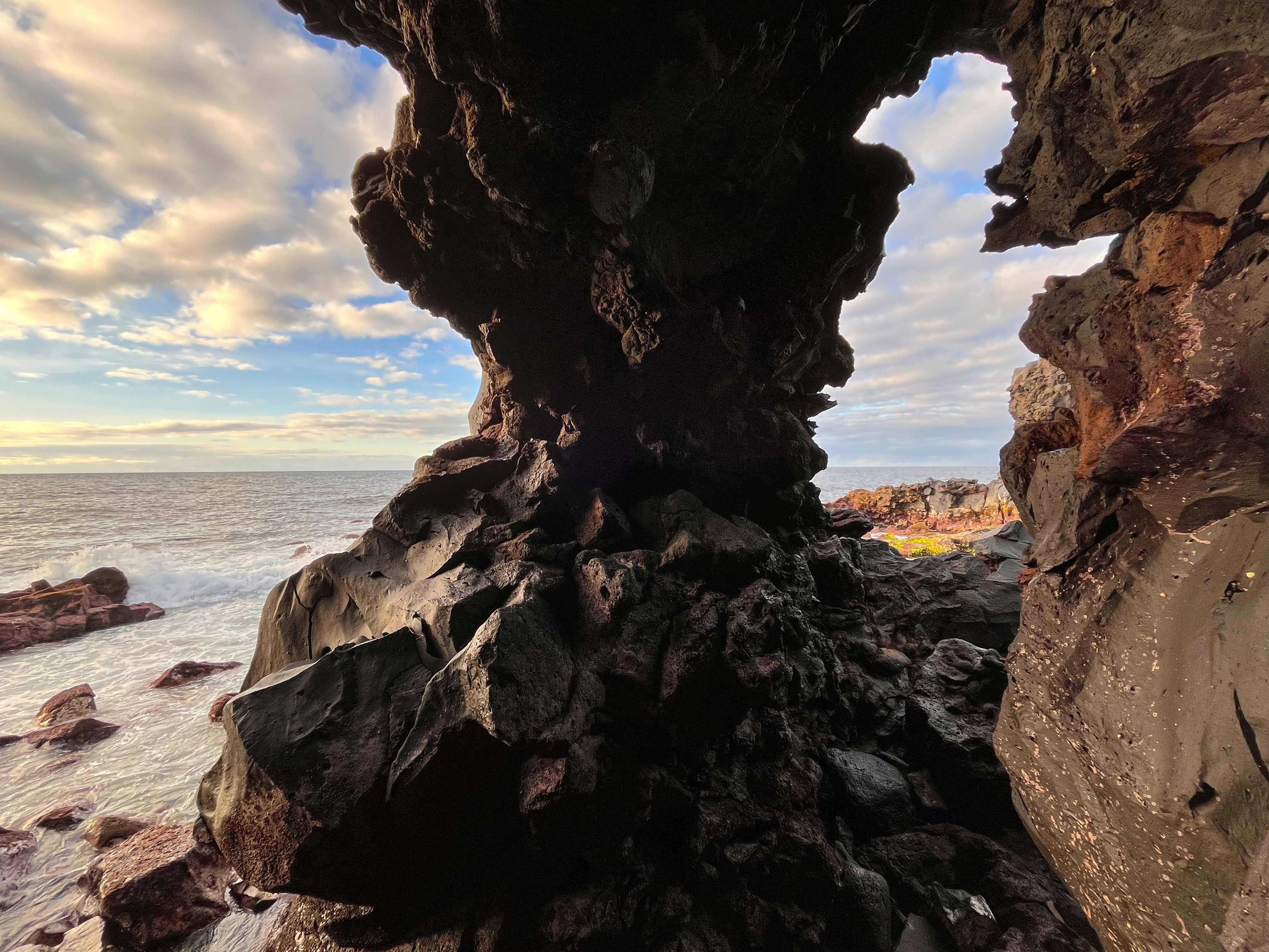 A rock formation on the shore of a body of water photo – Free Azores ...