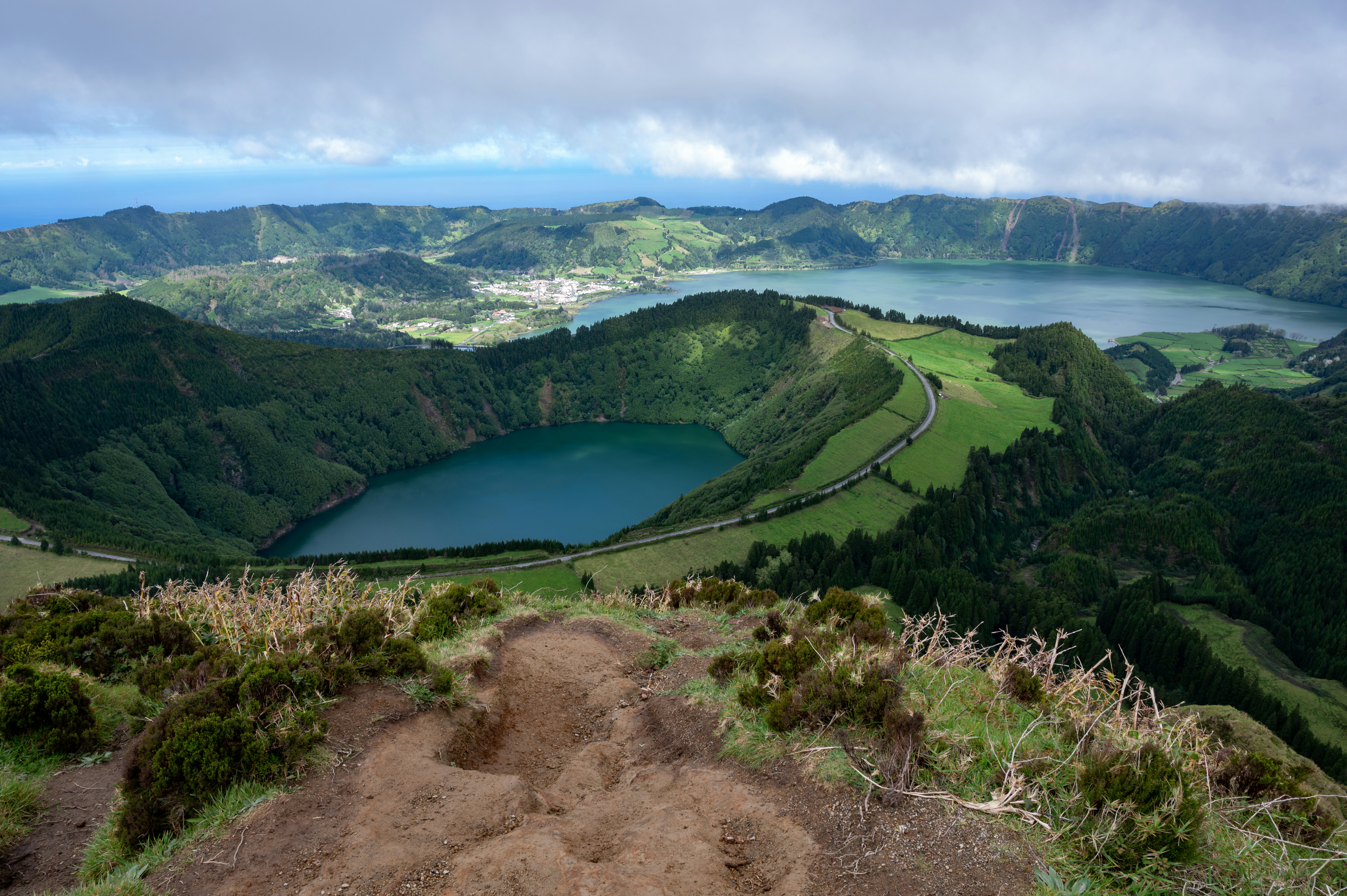 a view of a lake from a mountain top, 