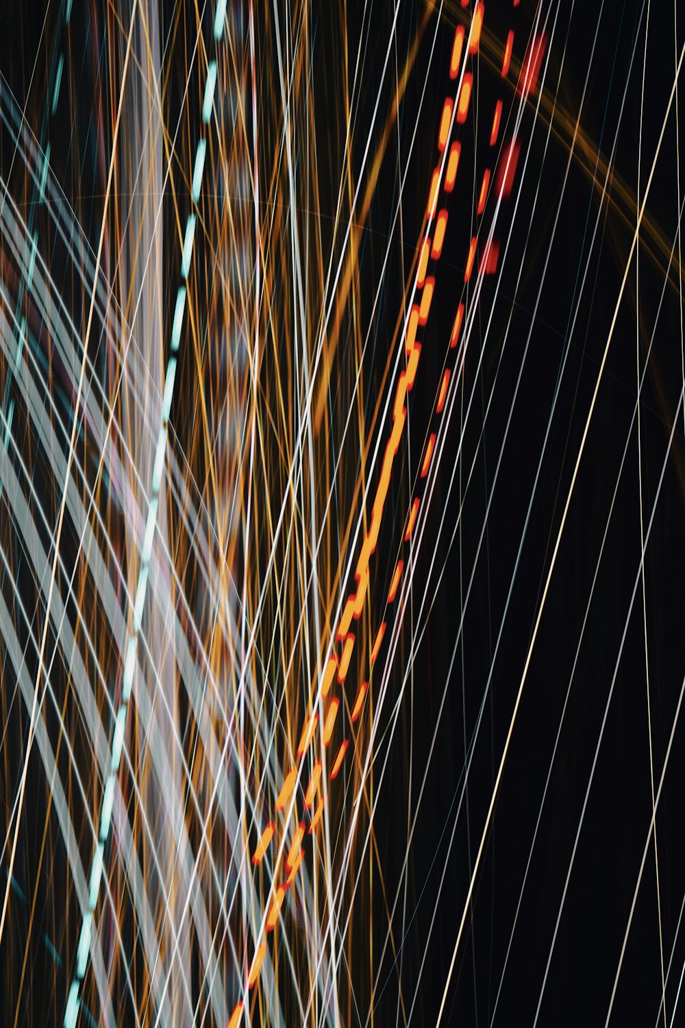 a blurry image of a clock tower in the night