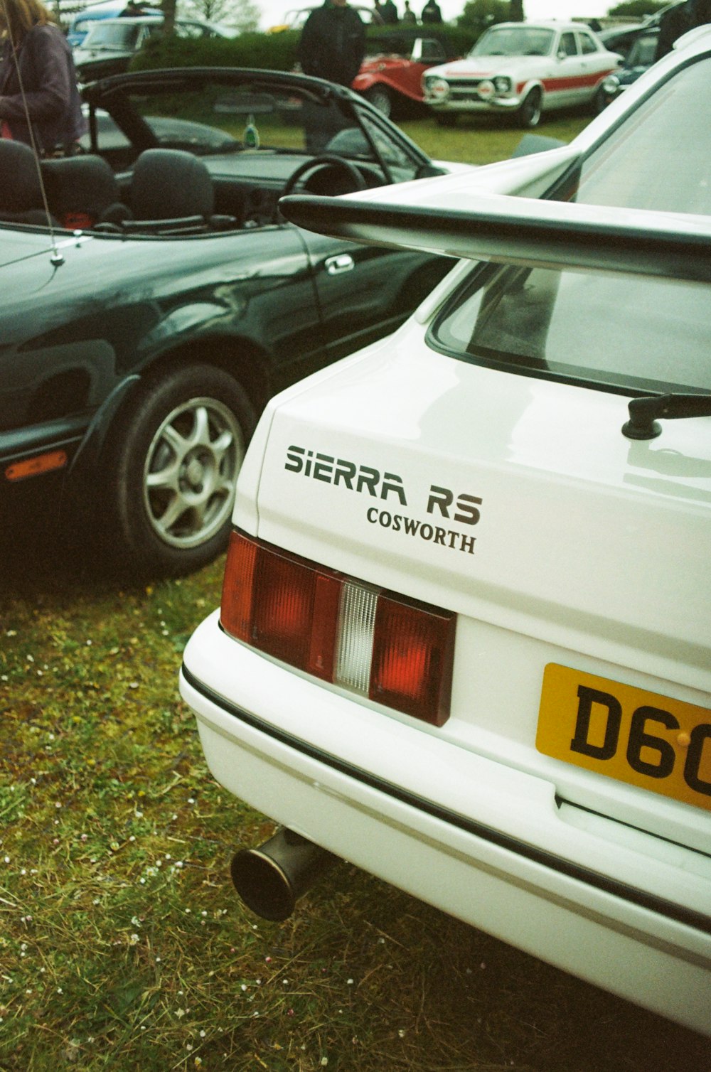 a group of cars parked next to each other