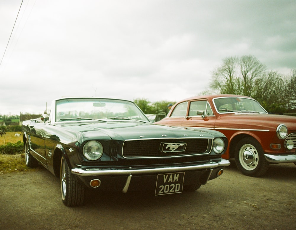 a couple of cars parked next to each other