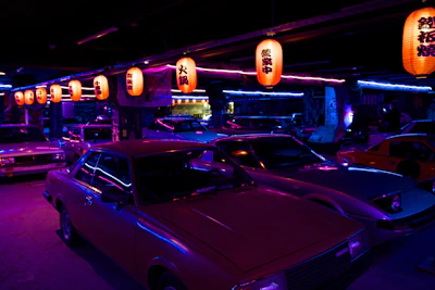 a group of cars parked in a garage