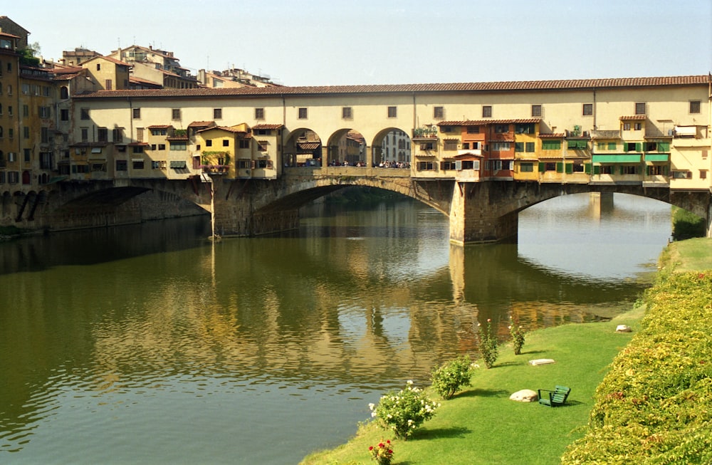 a bridge over a body of water in a city