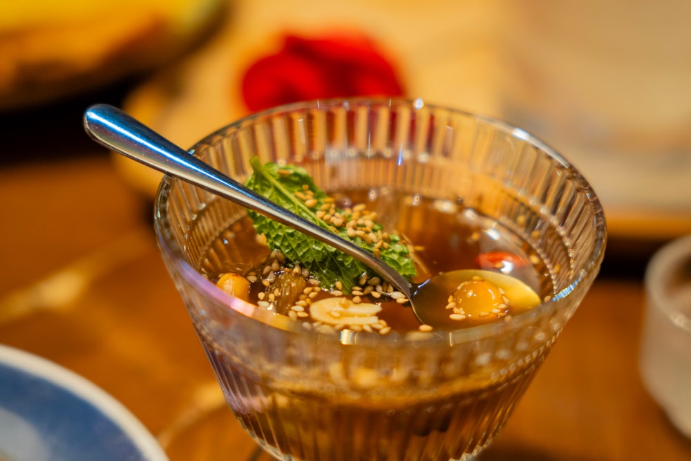 a bowl of food with a spoon in it