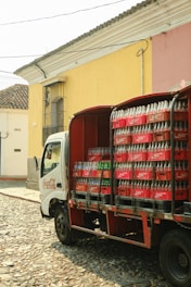 a truck is loaded with cans of soda