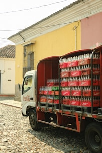 a truck is loaded with cans of soda