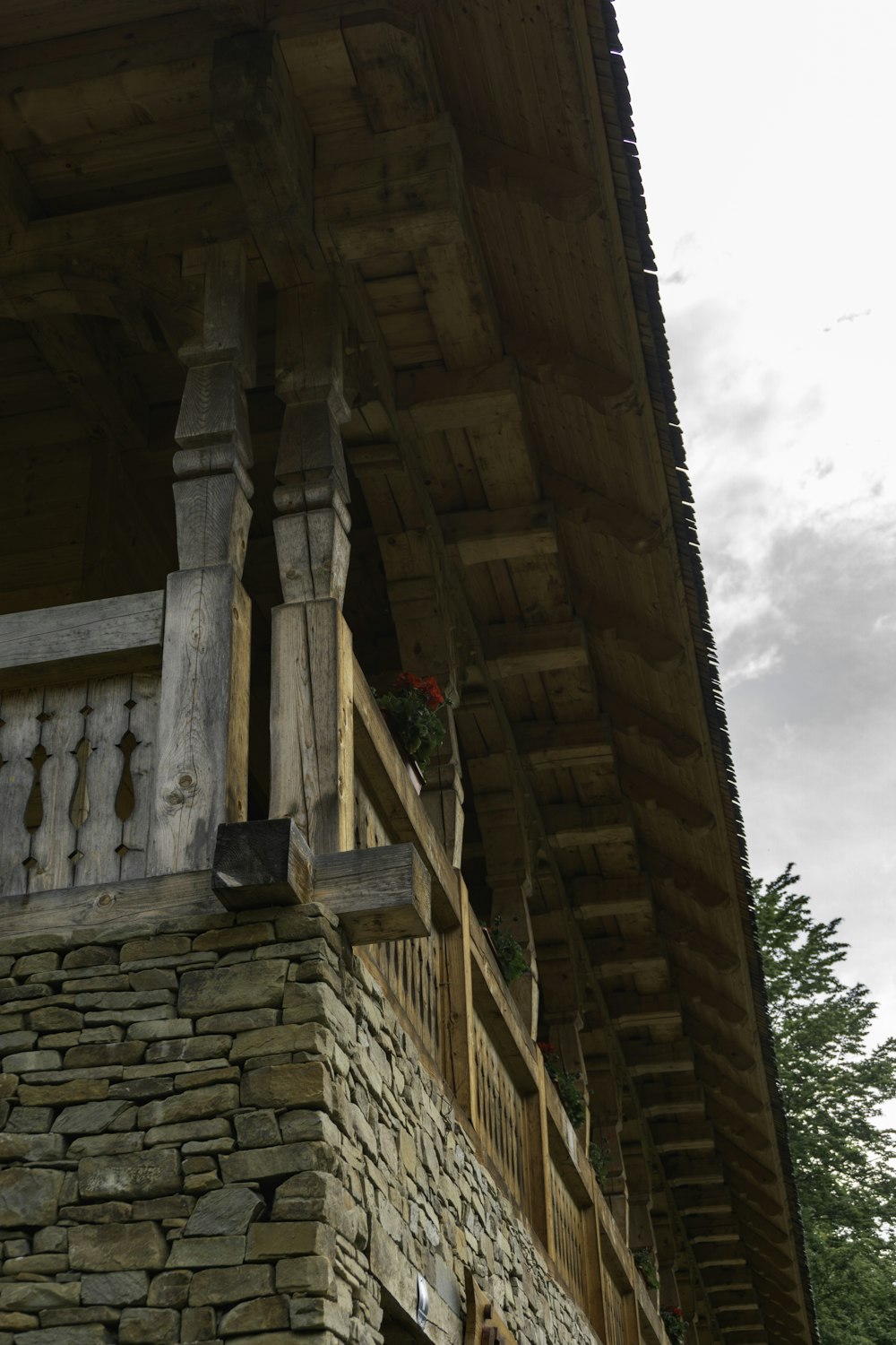 a clock on the side of a stone building