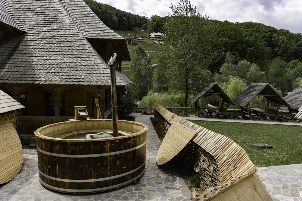 a wooden hot tub sitting in front of a building