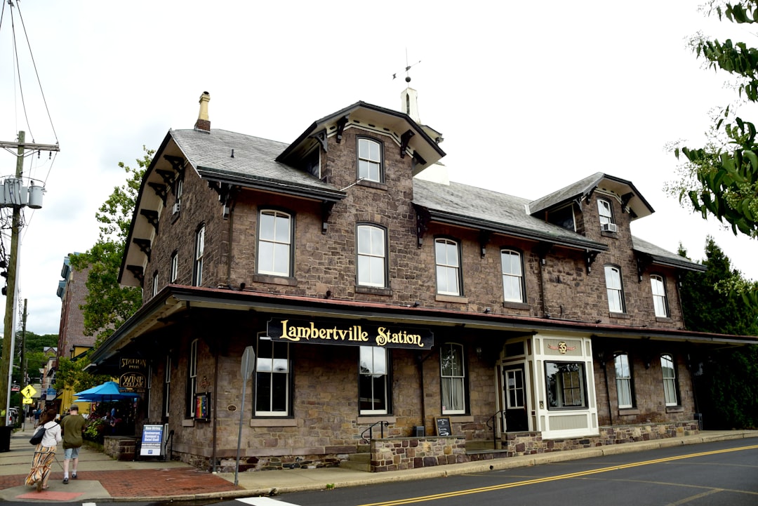 a brick building with a clock tower on top of it, A restaurant-inn built at the abandoned 19th century train station.