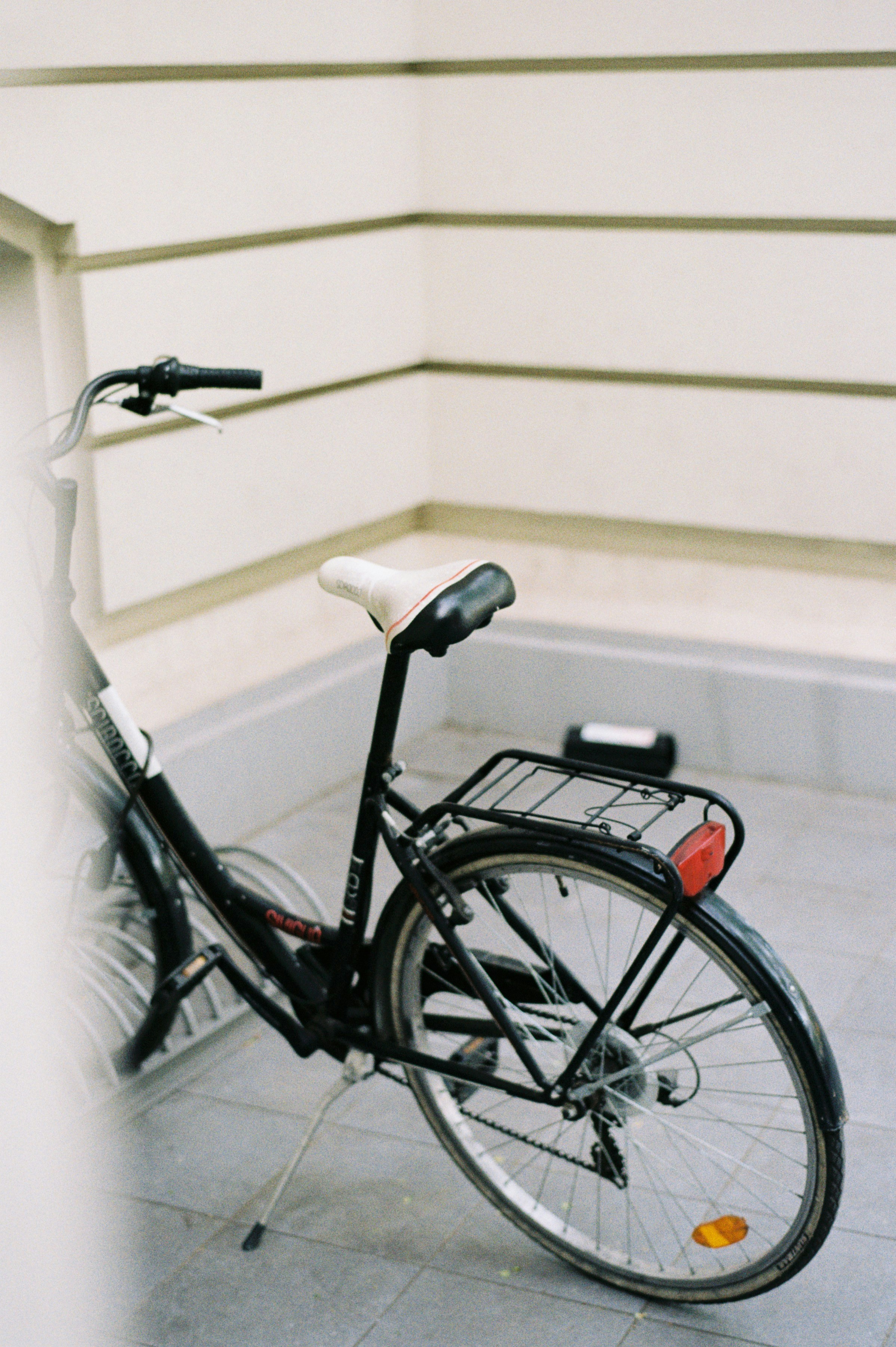 a bicycle parked in front of a building