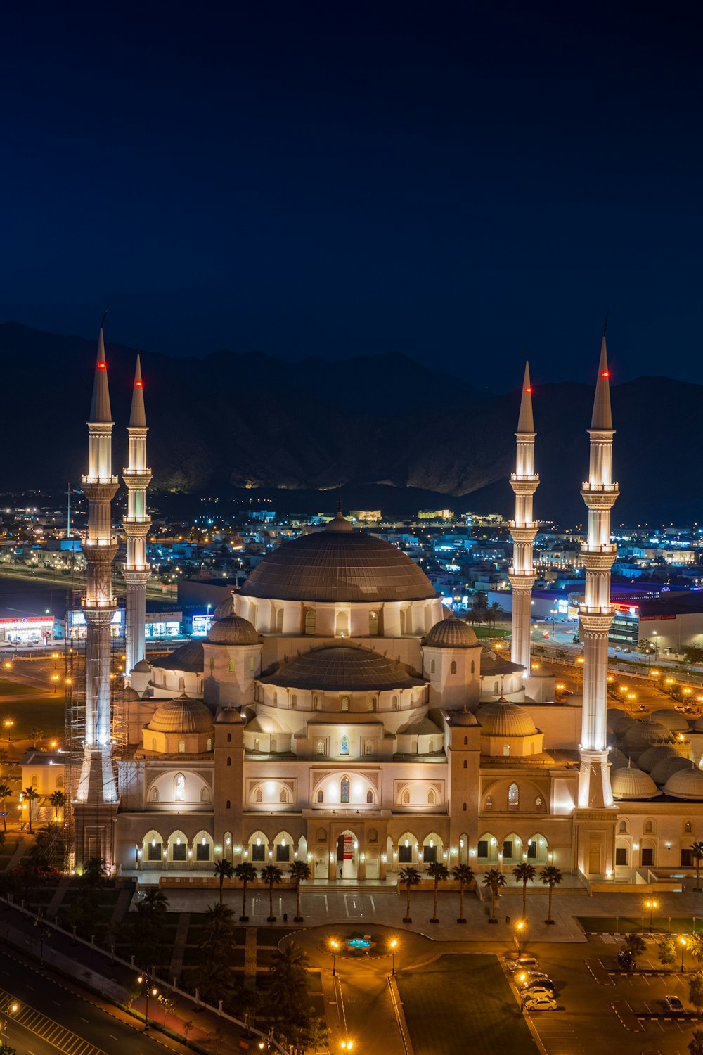 a night view of a large building with many lights on it