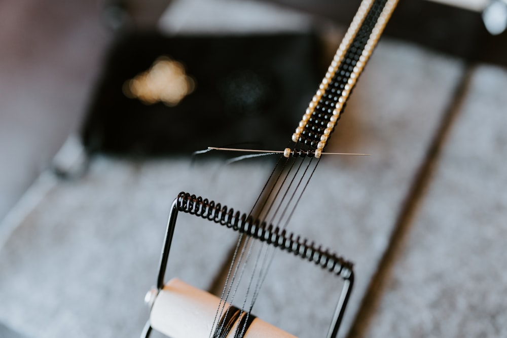 a close up of a musical instrument with strings