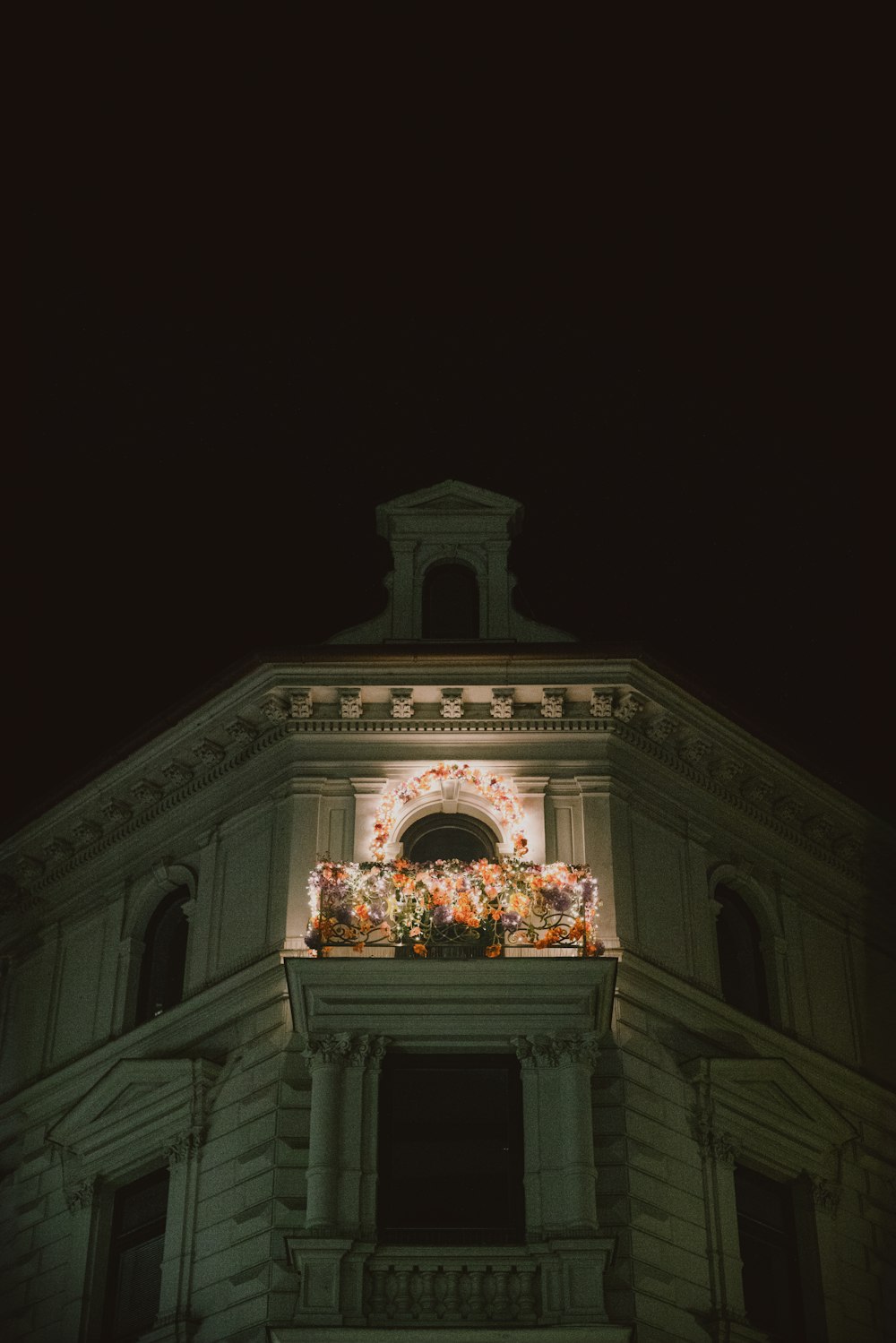 a building with a clock on the top of it