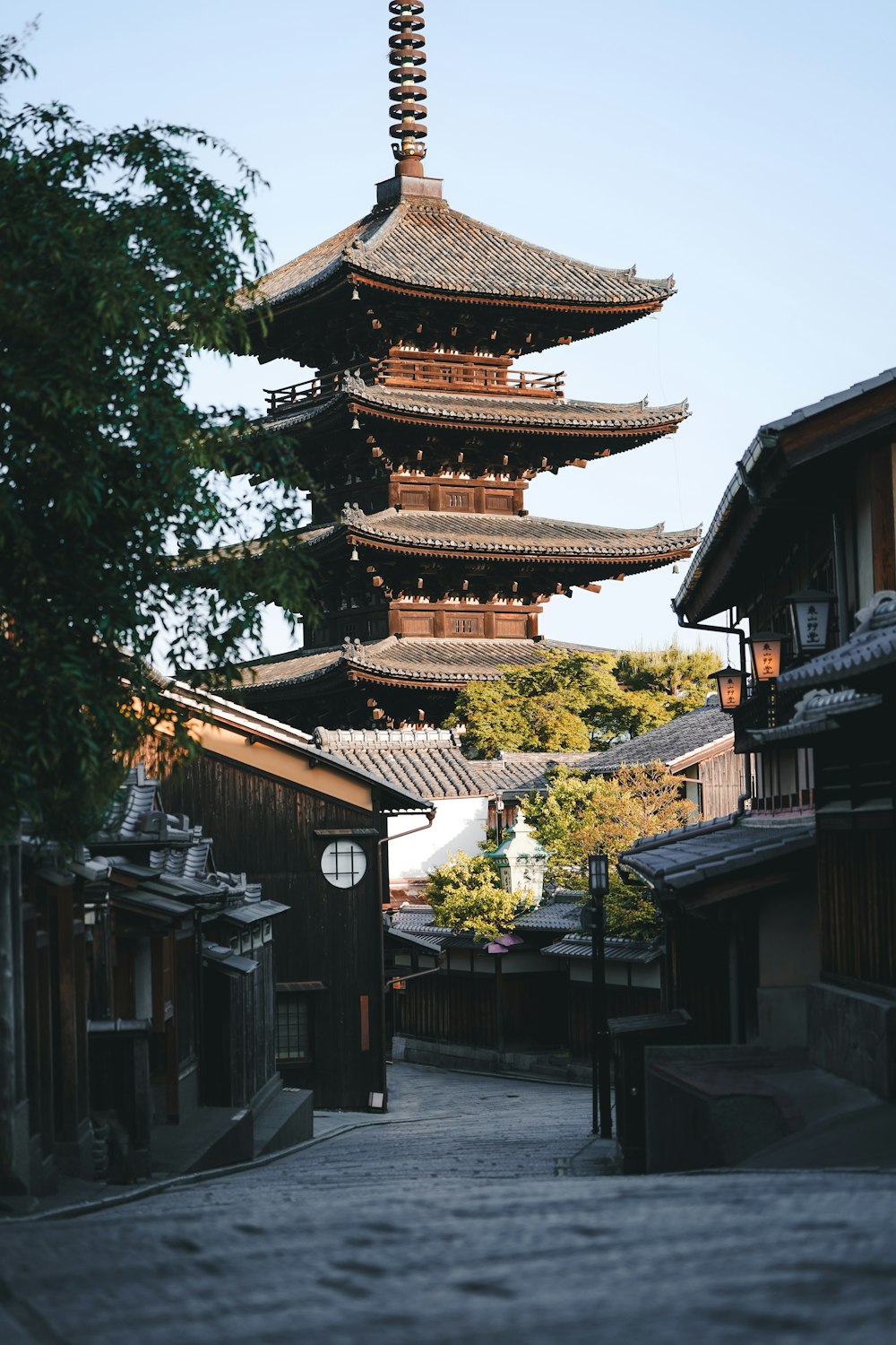 a tall tower with a clock on the top of it