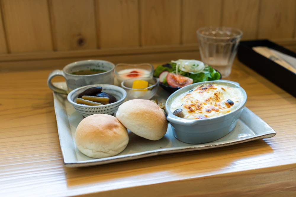 a plate of food on a table with a drink